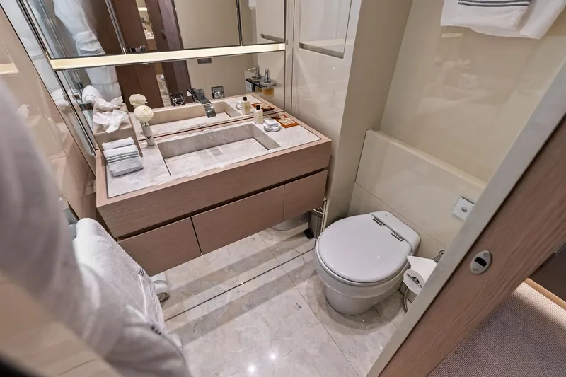 Glory Yacht Photos Pics Luxurious bathroom in 2023 Sanlorenzo SD126 yacht with modern fixtures and elegant design.