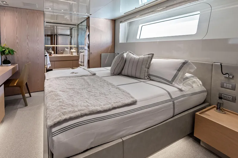 Glory Yacht Photos Pics Luxurious bedroom interior on 2023 Sanlorenzo SD126 yacht, featuring elegant design and modern amenities.