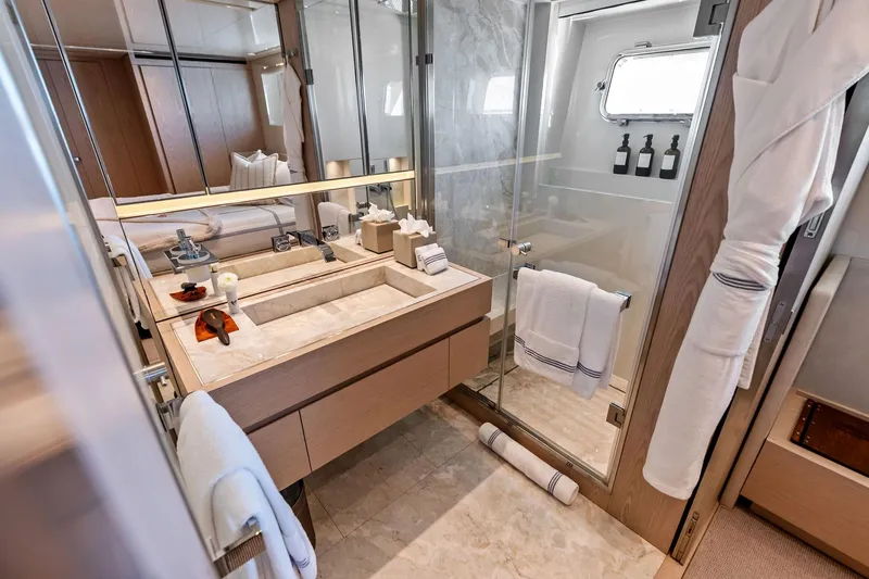 Glory Yacht Photos Pics Luxurious bathroom on 2023 Sanlorenzo SD126 yacht with modern fixtures and elegant design.