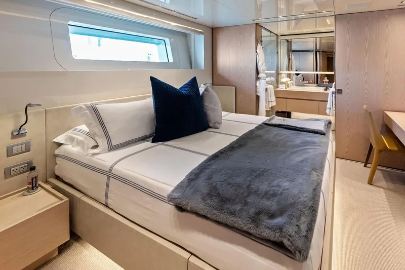 Glory Yacht Photos Pics Luxurious bedroom interior on 2023 Sanlorenzo SD126 yacht, featuring elegant bedding and modern design.
