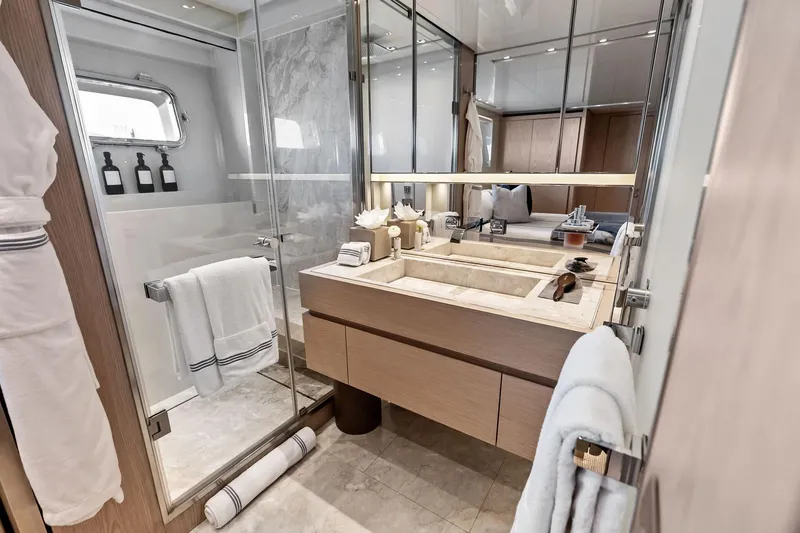 Glory Yacht Photos Pics Luxurious bathroom on 2023 Sanlorenzo SD126 yacht, featuring elegant marble and modern fixtures.