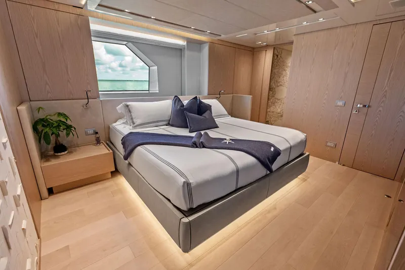 Glory Yacht Photos Pics Luxurious 2023 Sanlorenzo SD126 yacht bedroom with modern design and ocean view.