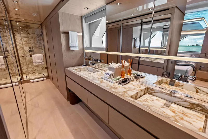 Glory Yacht Photos Pics Luxurious bathroom on 2023 Sanlorenzo SD126 yacht with marble countertops and modern fixtures.