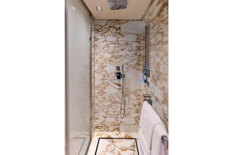 Glory Yacht Photos Pics Luxurious marble shower in 2023 Sanlorenzo SD126 yacht bathroom.