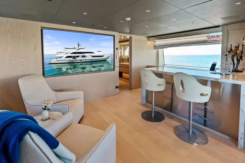 Glory Yacht Photos Pics Luxurious interior of 2023 Sanlorenzo SD126 yacht with modern seating and ocean view.