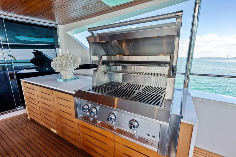 Glory Yacht Photos Pics Outdoor grill on 2023 Sanlorenzo SD126 yacht with ocean view.