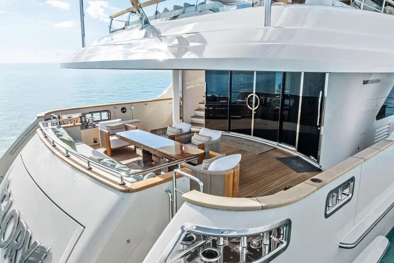Glory Yacht Photos Pics Luxurious 2023 Sanlorenzo SD126 yacht deck with elegant seating and ocean view.