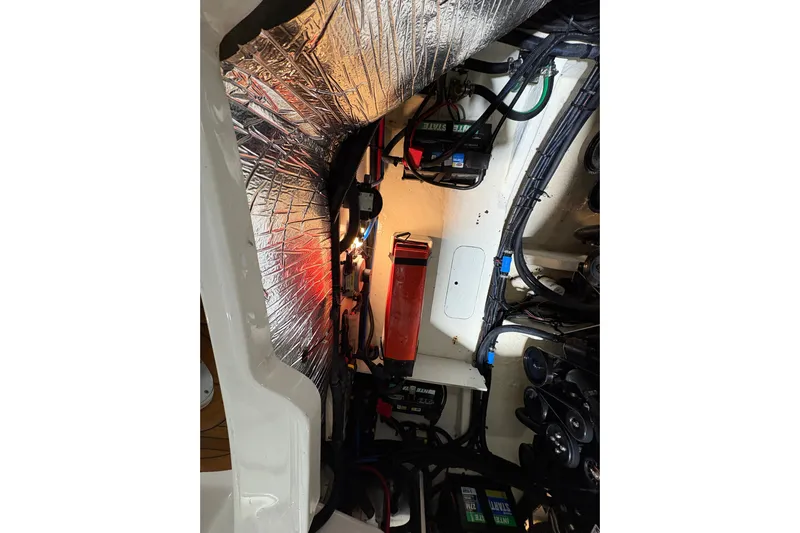  Yacht Photos Pics Engine compartment of a 2016 Sea Ray 350 SLX boat, showing wiring and components.