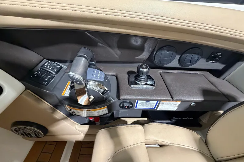  Yacht Photos Pics Control panel of 2016 Sea Ray 350 SLX boat with joystick and throttle controls.