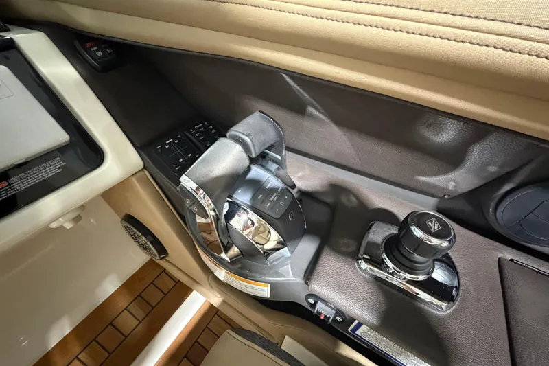  Yacht Photos Pics 2016 Sea Ray 350 SLX boat controls with joystick and throttle levers.