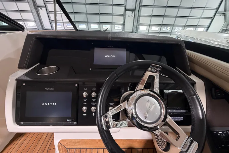  Yacht Photos Pics 2016 Sea Ray 350 SLX dashboard with Axiom displays and steering wheel.