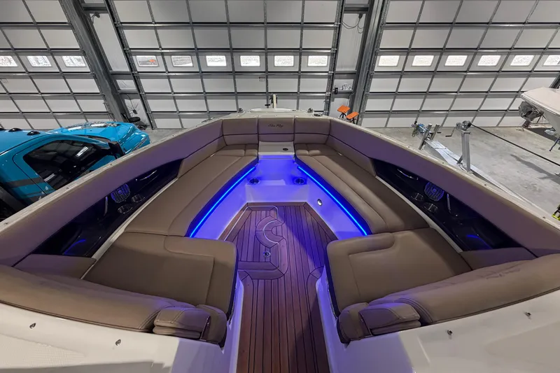  Yacht Photos Pics Luxurious 2016 Sea Ray 350 SLX boat interior with blue LED lighting and plush seating.