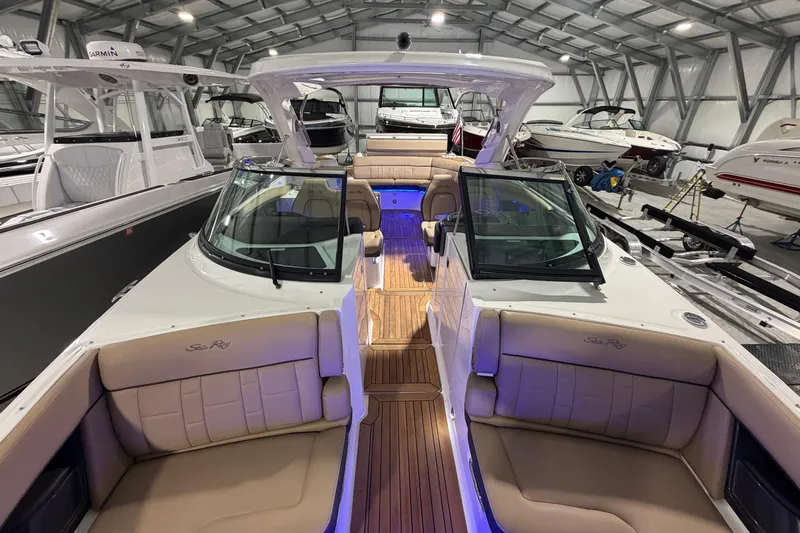  Yacht Photos Pics 2016 Sea Ray 350 SLX boat interior with luxurious seating in a showroom.