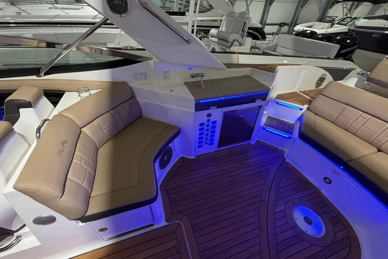  Yacht Photos Pics Interior of 2016 Sea Ray 350 SLX boat with seating and blue LED lighting.