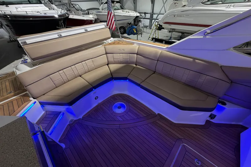  Yacht Photos Pics Luxurious 2016 Sea Ray 350 SLX boat interior with blue LED lighting and plush seating.