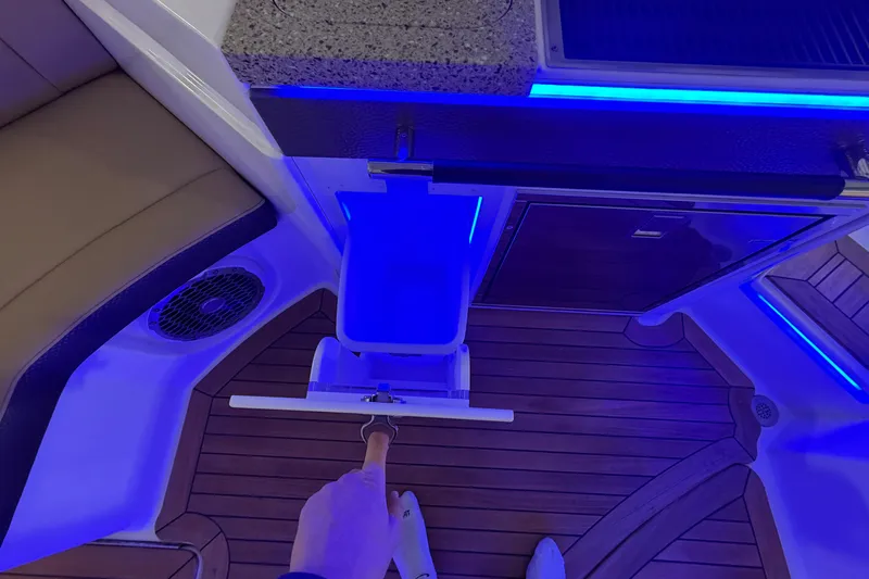  Yacht Photos Pics 2016 Sea Ray 350 SLX boat interior with blue LED lighting and wooden flooring.