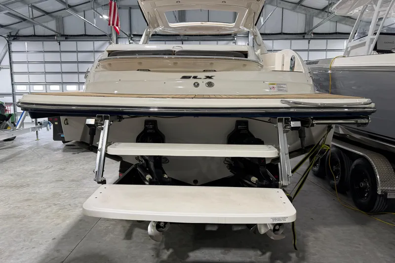  Yacht Photos Pics 2016 Sea Ray 350 SLX boat with extended swim platform in a storage facility.