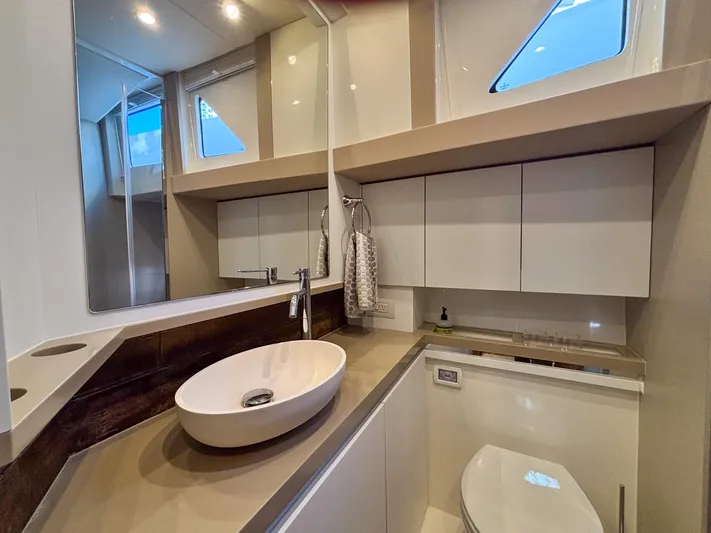 Micky's Dream Yacht Photos Pics Luxurious bathroom interior of 2020 Greenline 45 Fly yacht with modern fixtures and elegant design.