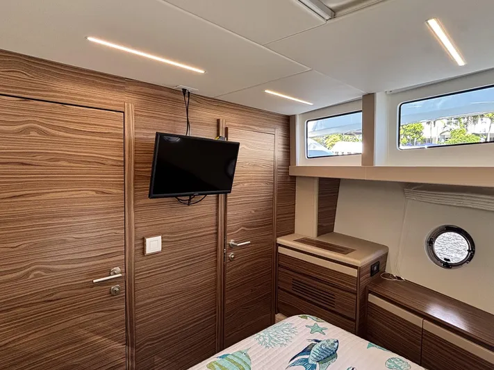 Micky's Dream Yacht Photos Pics Interior of 2020 Greenline 45 Fly yacht cabin with wood paneling and modern amenities.