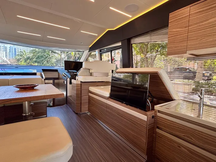 Micky's Dream Yacht Photos Pics Luxurious interior of 2020 Greenline 45 Fly yacht with modern wood finishes and sleek design.