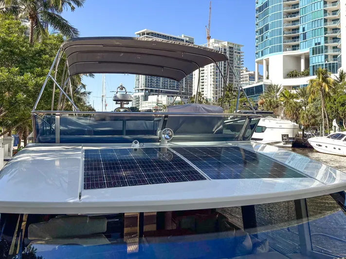 Micky's Dream Yacht Photos Pics 2020 Greenline 45 Fly yacht with solar panels docked in a marina.