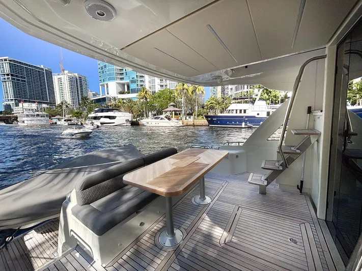 Micky's Dream Yacht Photos Pics Luxury yacht Greenline 45 Fly 2020, docked with cityscape view, featuring elegant outdoor seating.