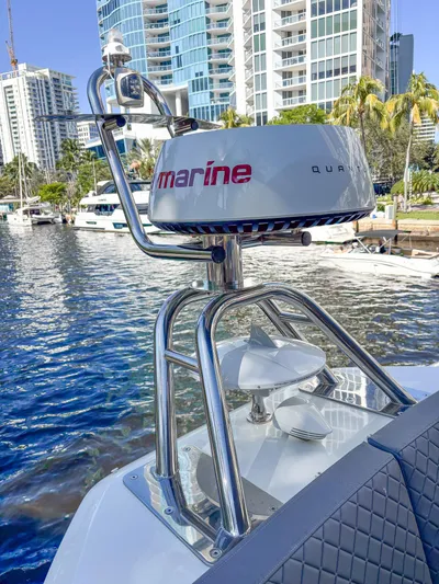 Micky's Dream Yacht Photos Pics Radar equipment on a 2020 Greenline 45 Fly yacht, with cityscape and marina background.