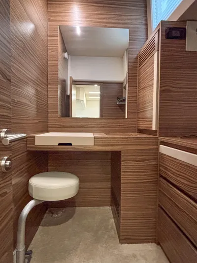 Micky's Dream Yacht Photos Pics Luxurious vanity area in 2020 Greenline 45 Fly yacht with wood finish and mirror.