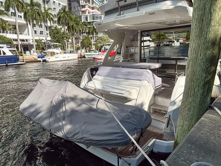 Micky's Dream Yacht Photos Pics 2020 Greenline 45 Fly yacht docked, featuring covered equipment and modern design.