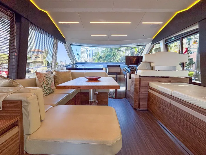 Micky's Dream Yacht Photos Pics Luxurious interior of 2020 Greenline 45 Fly yacht with modern seating and wooden accents.