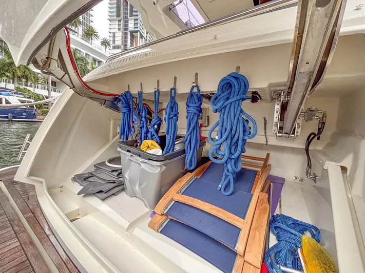 Micky's Dream Yacht Photos Pics Storage compartment of a 2020 Greenline 45 Fly yacht with ropes and equipment.