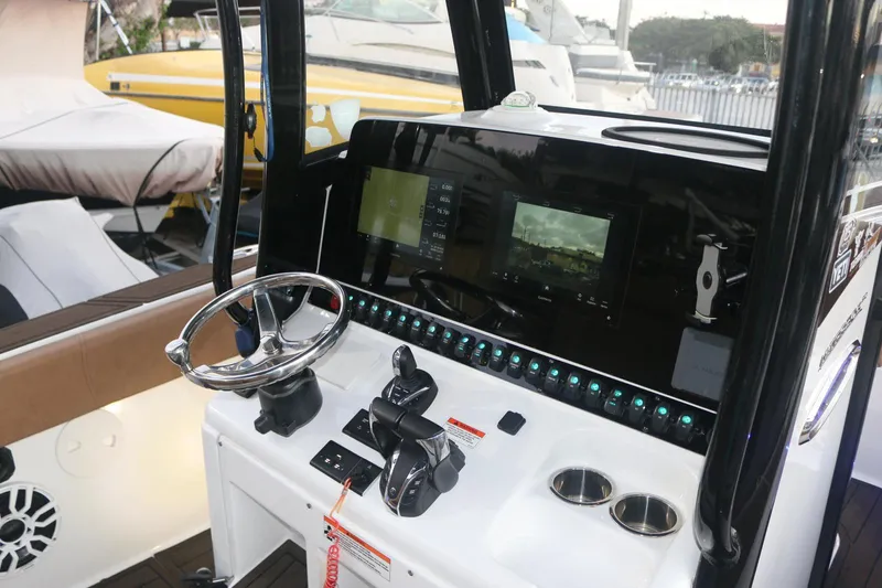  Yacht Photos Pics 2022 Sea Hunt Ultra 305 SE boat dashboard with modern controls and navigation screens.