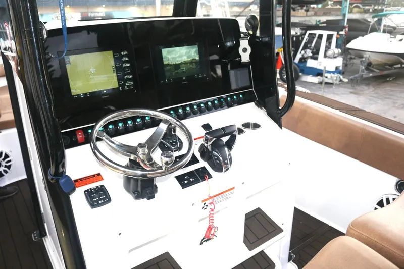 Yacht Photos Pics 2022 Sea Hunt Ultra 305 SE boat dashboard with modern controls and navigation screens.