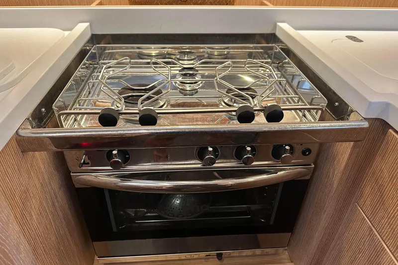 Dream Time Yacht Photos Pics Modern kitchen stove and oven in 2022 Bavaria C45 yacht interior.