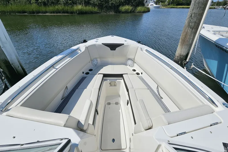  Yacht Photos Pics 2023 Sailfish 276 DC boat interior with spacious seating and sleek design.