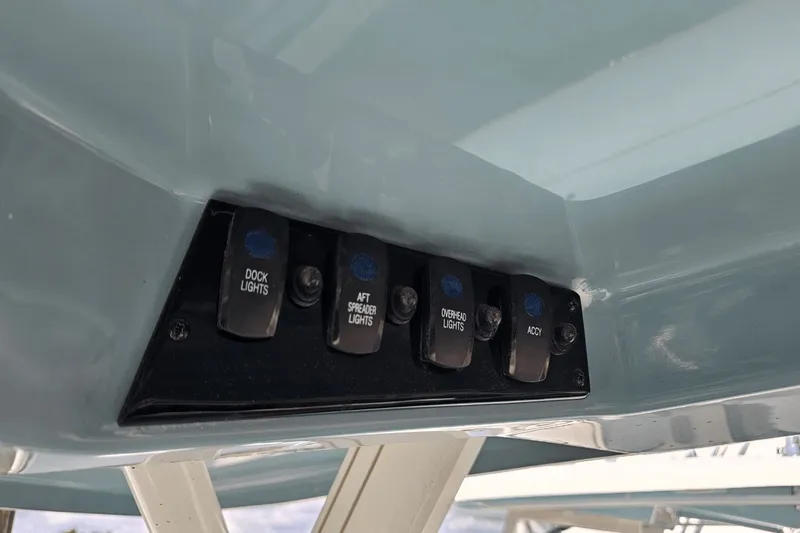  Yacht Photos Pics Control panel on 2023 Sailfish 276 DC boat with labeled light switches.