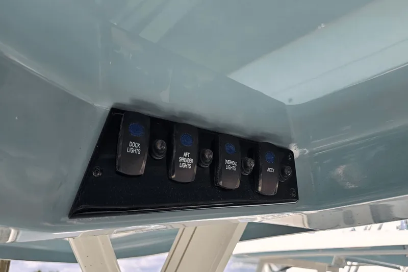  Yacht Photos Pics Control panel on 2023 Sailfish 276 DC boat with labeled light switches.