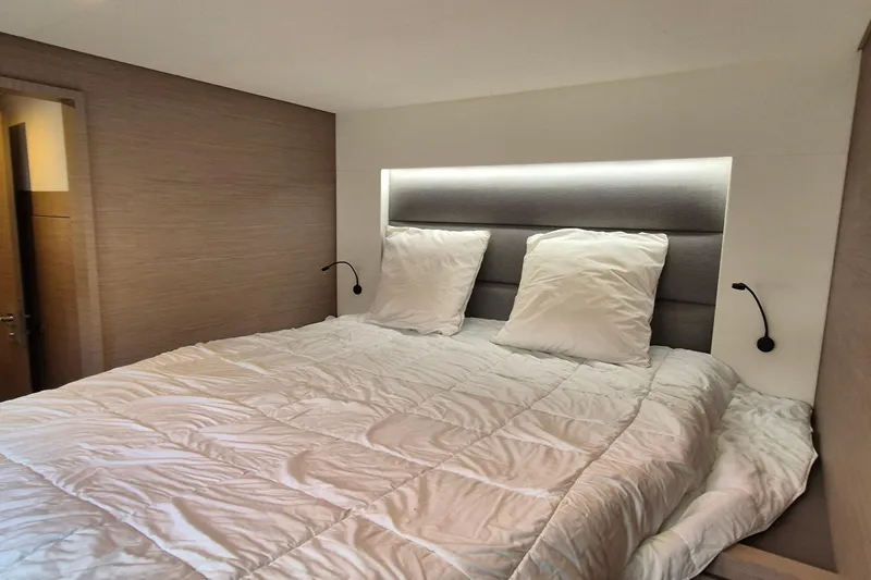  Yacht Photos Pics Luxurious bedroom interior of 2021 Fountaine Pajot Saona 47 catamaran.