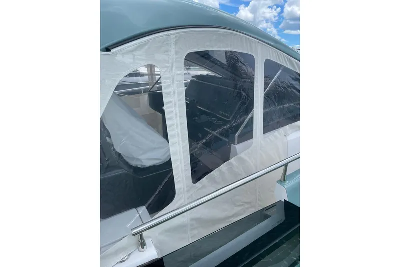  Yacht Photos Pics 2025 Azimut Verve 48 yacht with protective canopy and sleek design.