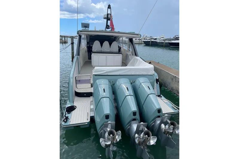  Yacht Photos Pics Azimut Verve 48 yacht, 2025 model, docked with triple outboard engines.