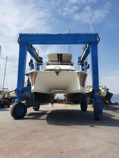  Yacht Photos Pics 2016 Fountaine Pajot MY 37 catamaran in dry dock under blue sky.