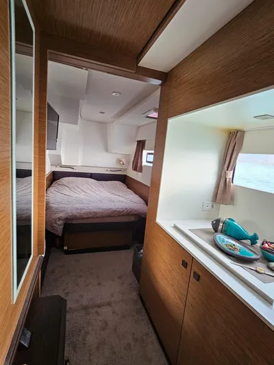  Yacht Photos Pics Interior of 2016 Fountaine Pajot MY 37 yacht, featuring cozy bedroom and modern decor.