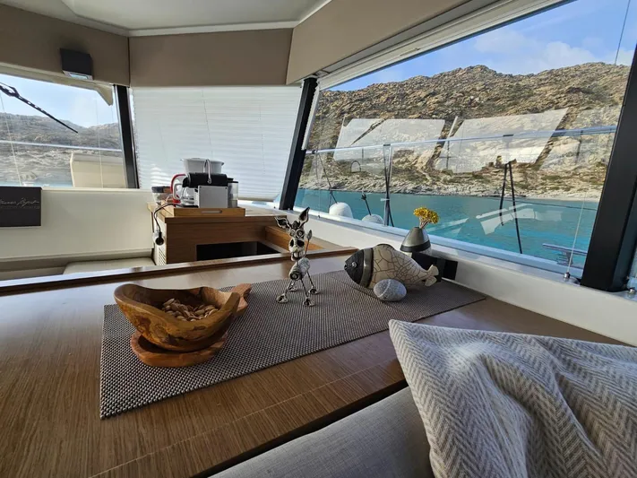  Yacht Photos Pics Interior of 2016 Fountaine Pajot MY 37 yacht with scenic ocean view.