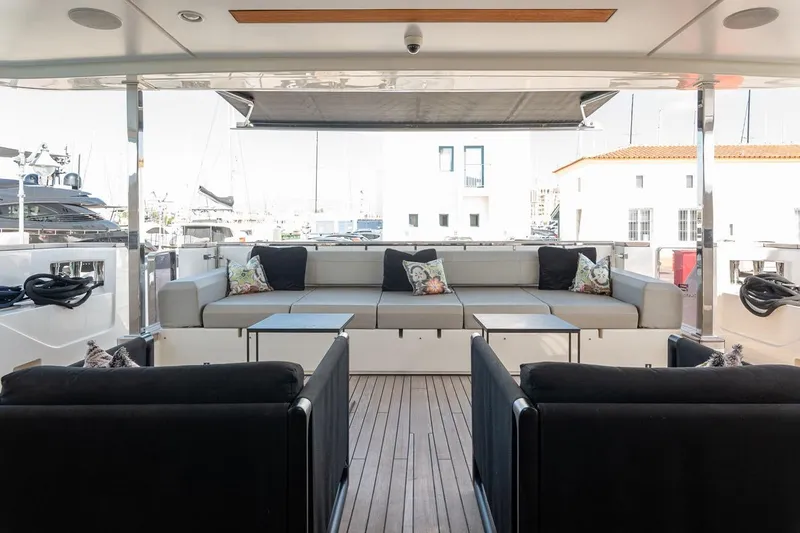 Willpower Yacht Photos Pics Luxurious 2018 FERETTI Navetta 37 yacht deck with elegant seating and modern design.