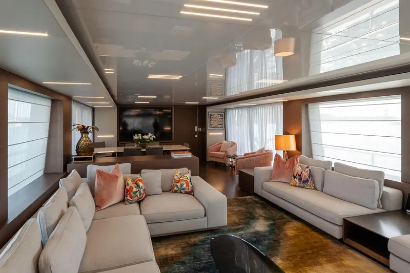Willpower Yacht Photos Pics Luxurious interior of 2018 FERETTI Navetta 37 yacht with elegant sofas and modern decor.