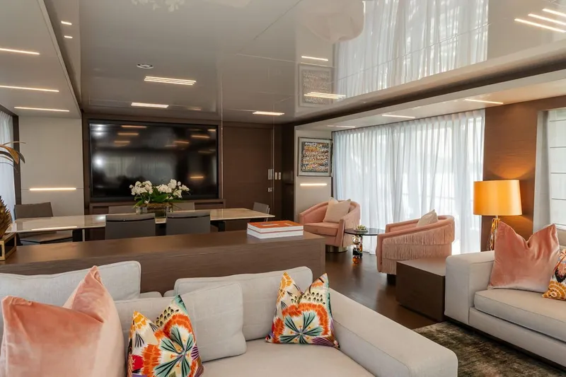 Willpower Yacht Photos Pics Luxurious interior of 2018 FERETTI Navetta 37 yacht with elegant seating and modern decor.