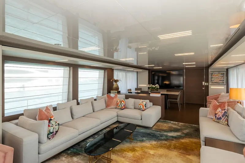 Willpower Yacht Photos Pics Luxurious interior of 2018 FERETTI Navetta 37 yacht with modern decor and spacious seating.