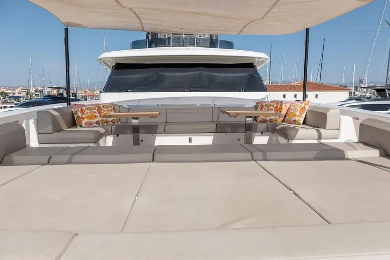 Willpower Yacht Photos Pics Luxurious 2018 FERETTI Navetta 37 yacht deck with seating and colorful cushions.