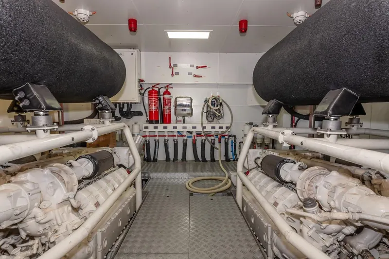 Willpower Yacht Photos Pics Engine room of 2018 FERETTI Navetta 37 yacht with machinery and safety equipment.