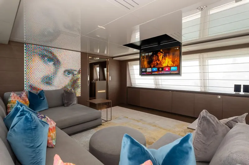 Willpower Yacht Photos Pics Luxurious 2018 FERETTI Navetta 37 yacht interior with modern decor and entertainment system.